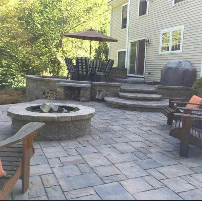 Affordable lawn mowing service for outdoor upgrades in Manchester, NH by Accurate Landscape & Snow Management