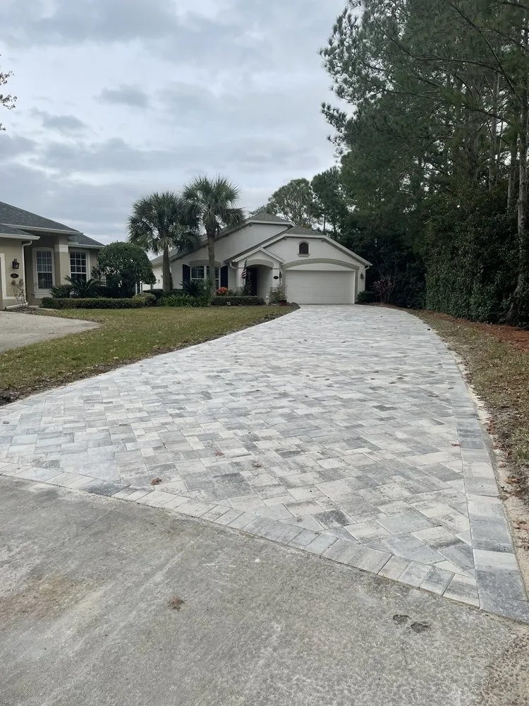 Expert lawn mowing service for year-round maintenance in Apopka, FL by Accurate Pavers & Landscape