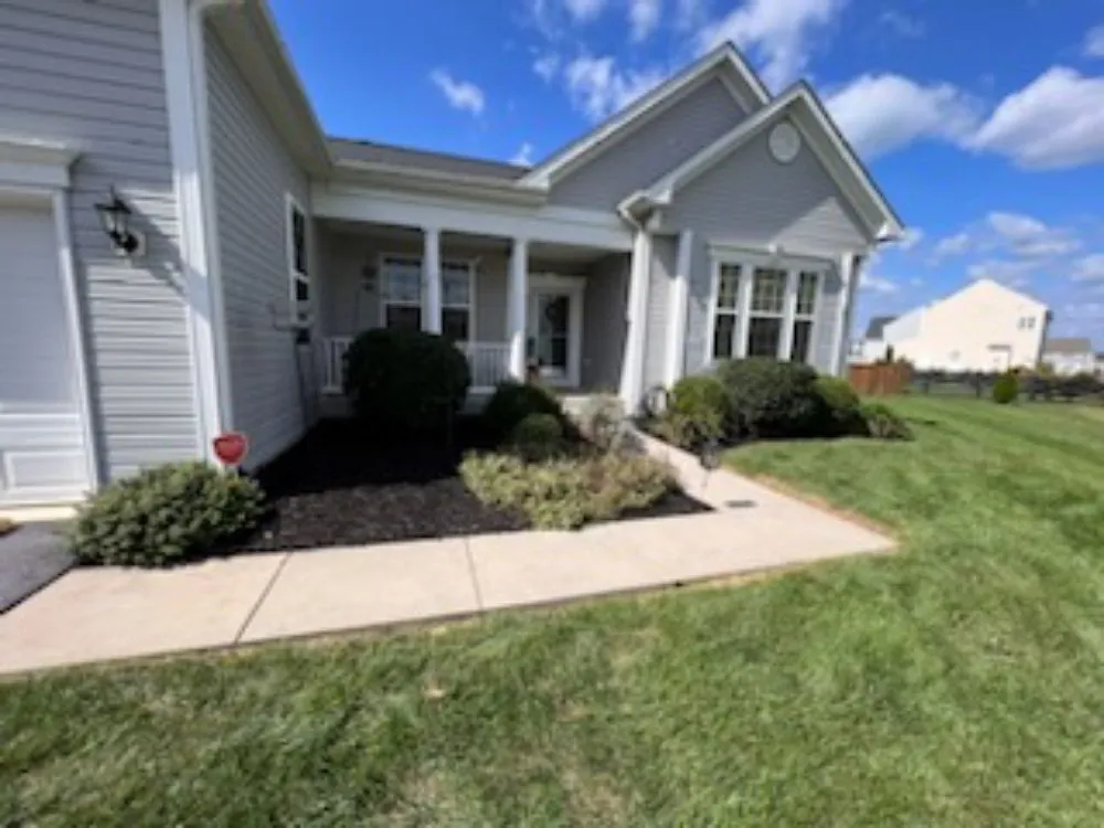 Professional lawn mowing service for residential properties in Martinsburg, WV by Ace & Axle Landscaping