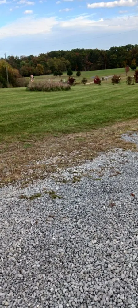 Professional lawn mowing service for year-round maintenance in Martinsburg, WV by Ace & Axle Landscaping