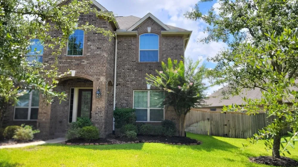 Custom outdoor landscaping in Porter, TX by Ace Ingenuity