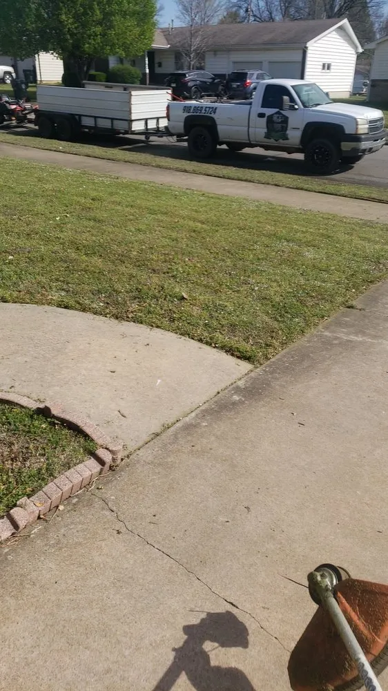 Custom landscape design for homes in Fort Gibson, OK by Ace of Blade'z Lawncare