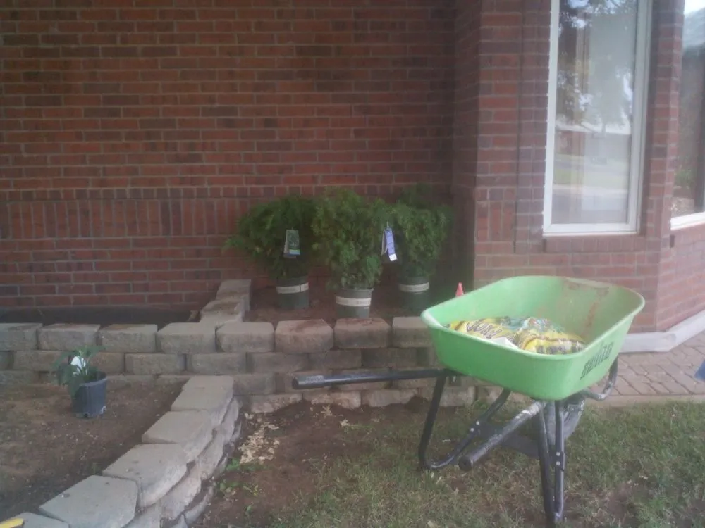 Local yard cleanup service with custom design in Sartell, MN by Ace Team Landscape and Property Services