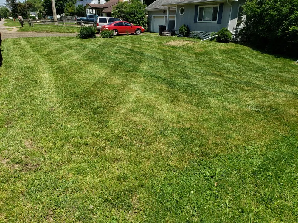 Reliable lawn mowing service with custom design in Hanover, MI by Ackley's Property Services