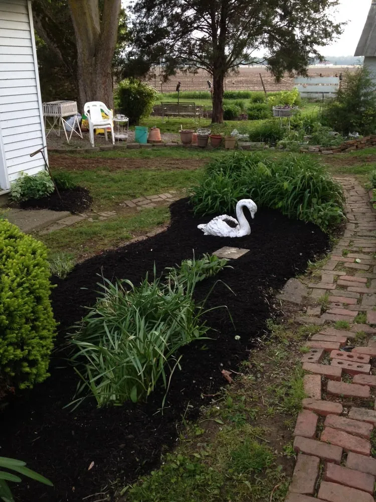 Affordable garden landscaping with custom design in Shelbyville, IN by ACL Lawn Care Group