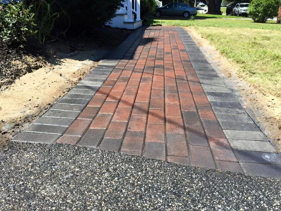 Custom yard maintenance for year-round maintenance in Burlington, MA by Acorn Landscaping & Masonry