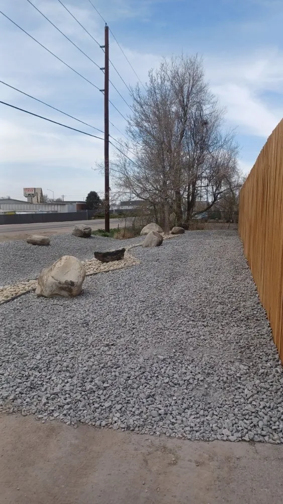 Professional yard maintenance for residential properties in Denver, CO by Acorn Landscaping