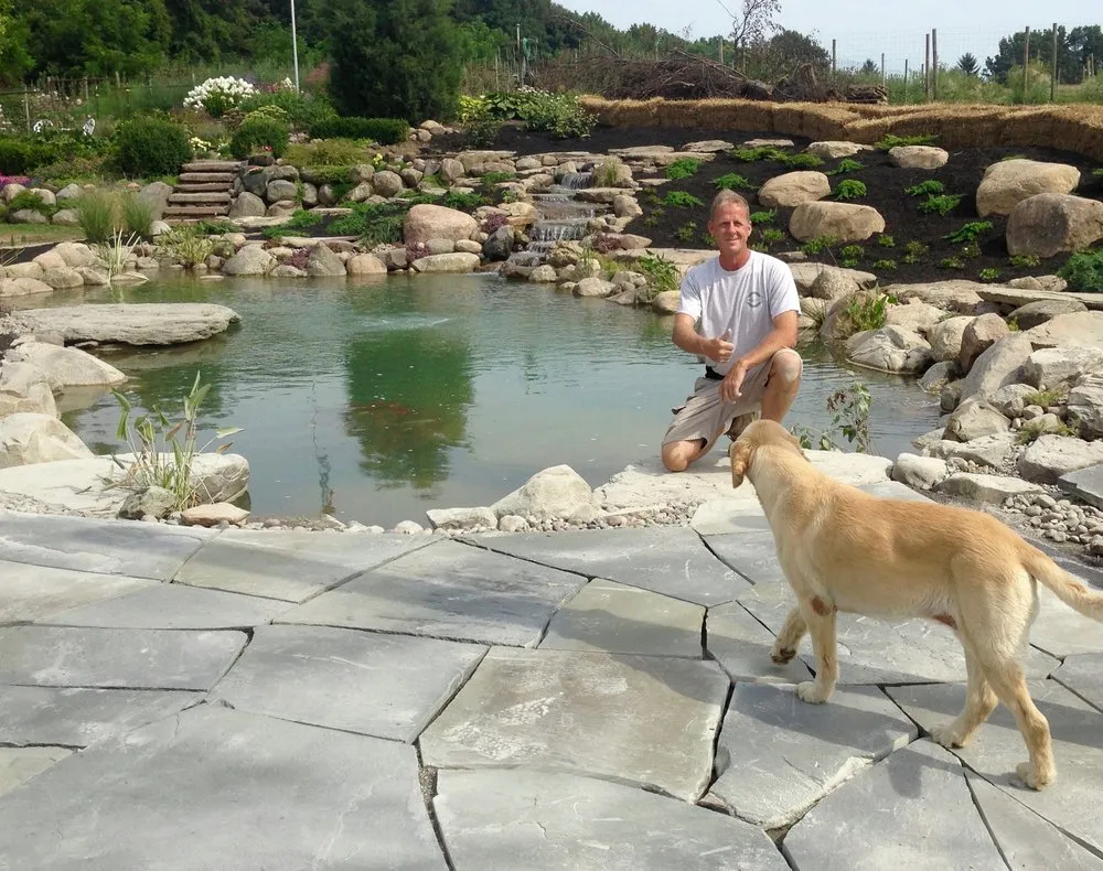 Expert lawn mowing service for beautiful yards across Churchville, NY - Acorn Ponds & Waterfalls