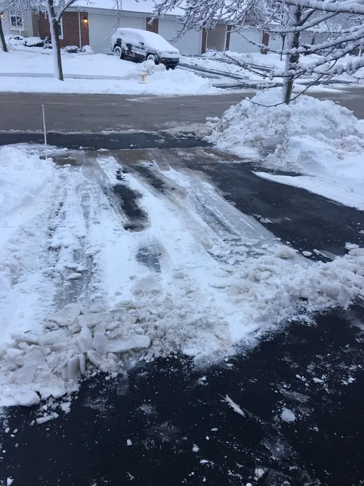 Professional lawn mowing service for year-round maintenance in Plainfield, IL by Acres Group