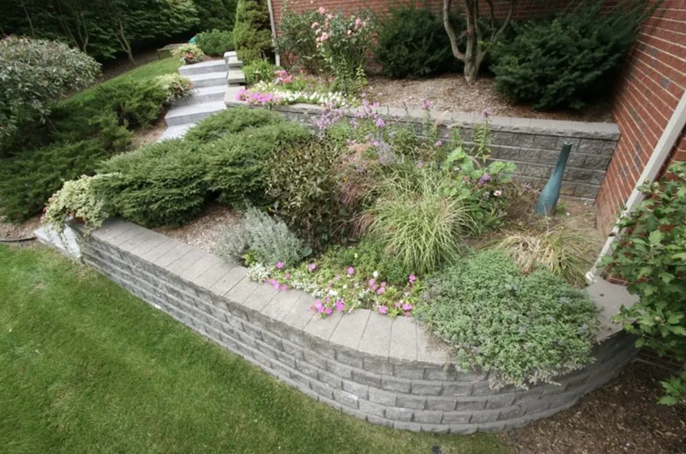 Affordable yard cleanup service for year-round maintenance in Canton, MI by Action Concrete & Landscaping Services