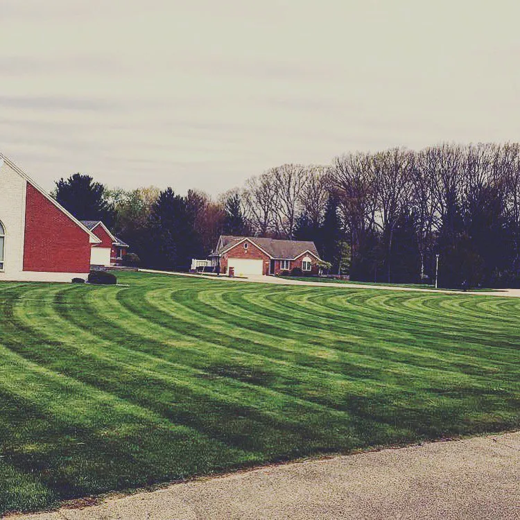 Expert yard maintenance for residential properties in Grand Rapids, MI by Action Lawncare and Snowplowing