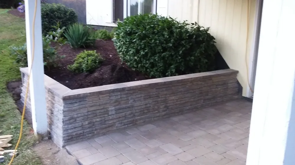 Custom yard cleanup service for year-round maintenance in Hollis, ME by Action Property Services