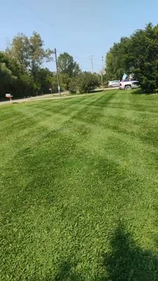 Adado's Lawn And Landscapes Logo