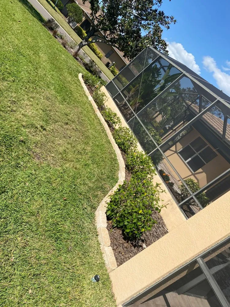 Custom landscape installation in Palmetto, FL by Adame Landscaping