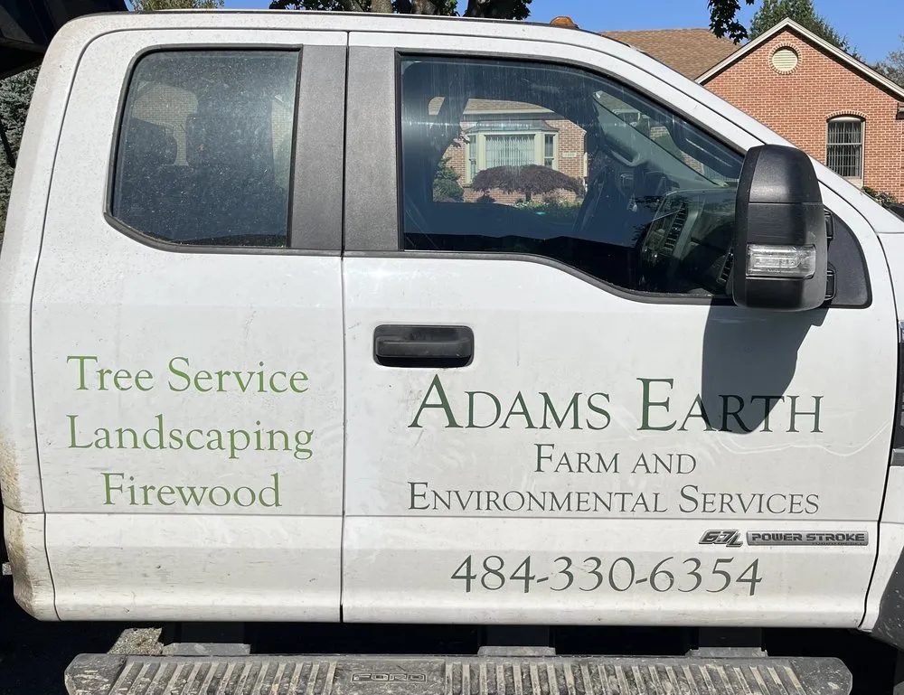 Professional lawn mowing service in Slatington, PA by Adam's Earth Farm and Environmental Services