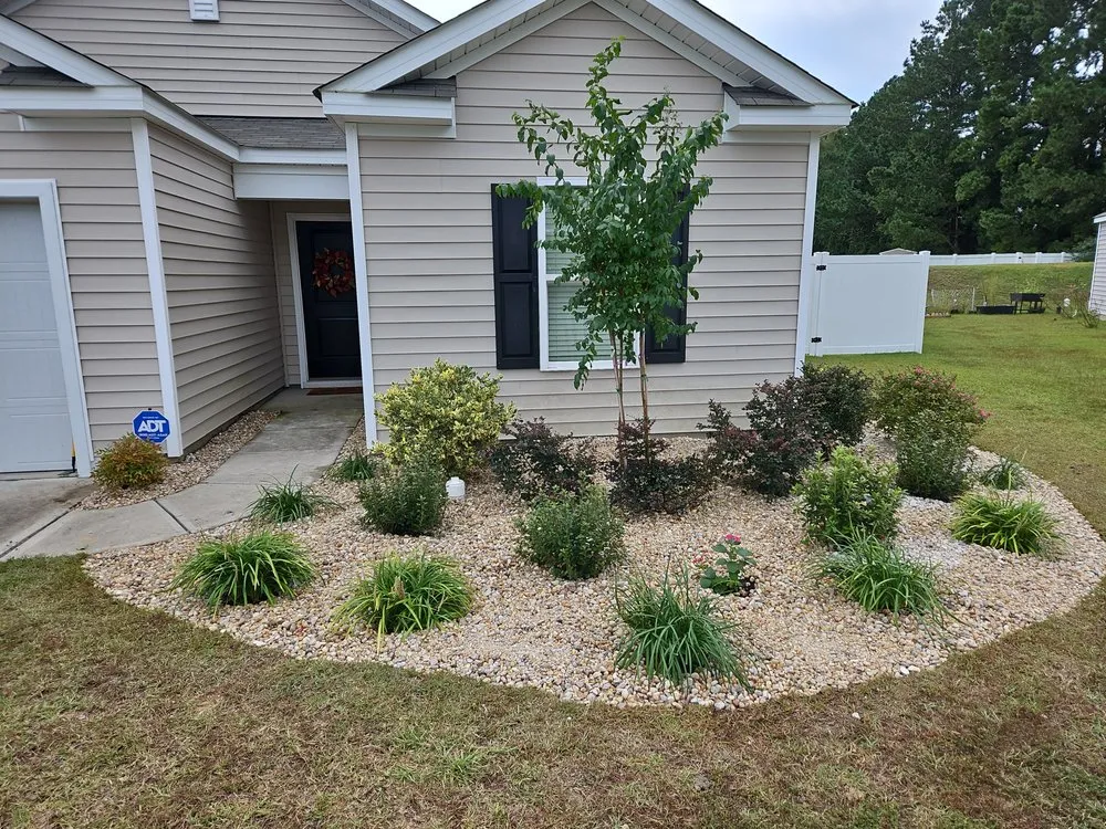 Expert yard cleanup service for year-round maintenance in Sunset Beach, NC by Adams Exterior Designs