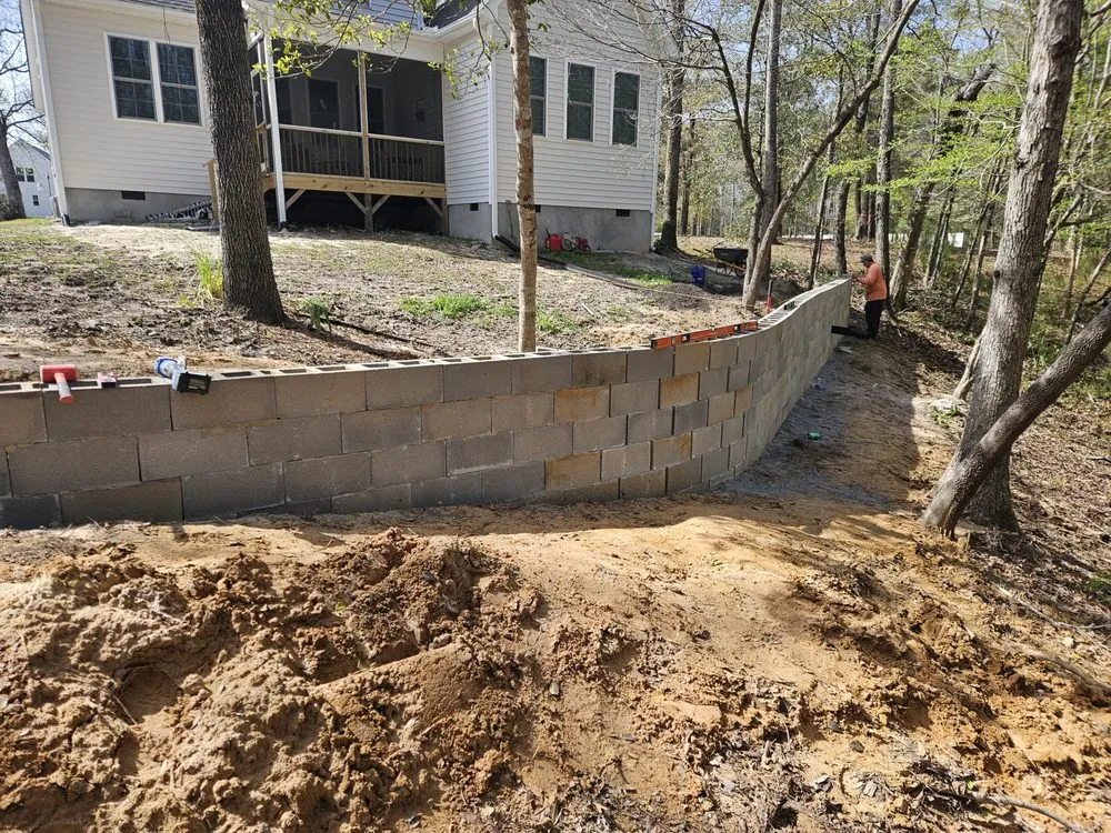 Custom lawn mowing service for outdoor upgrades across Sunset Beach, NC - Adams Exterior Designs