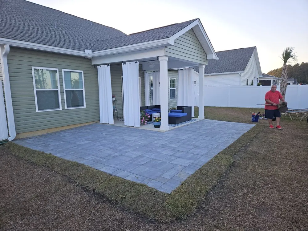Expert lawn mowing service in Sunset Beach, NC by Adams Exterior Designs