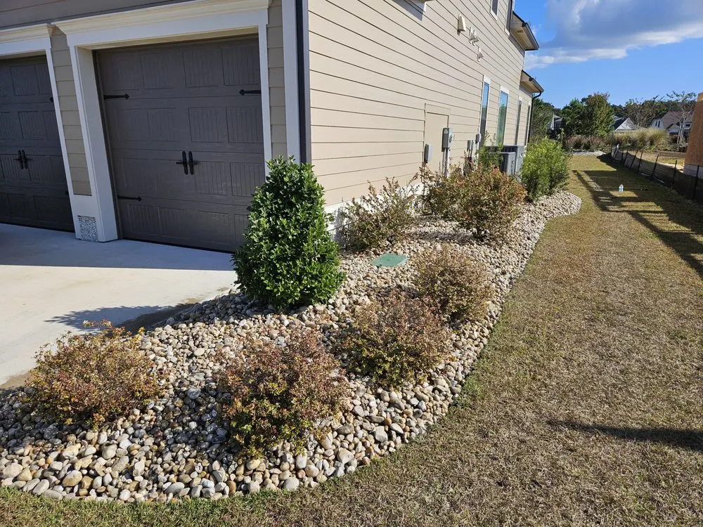 Custom garden landscaping in Sunset Beach, NC by Adams Exterior Designs