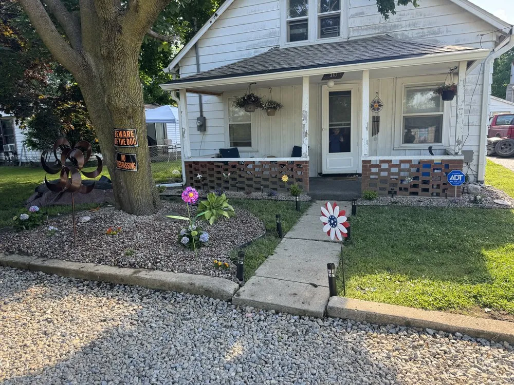 Affordable lawn care service for homes in Greenfield, IN by Adams Lawn Care