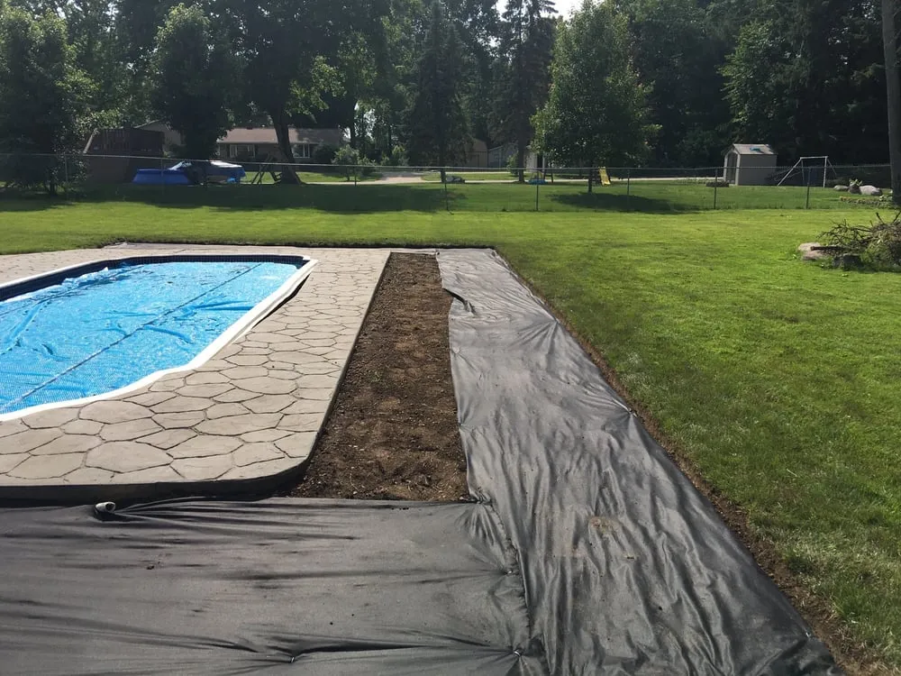 Custom garden landscaping for homes in Massillon, OH by Adams Lawncare