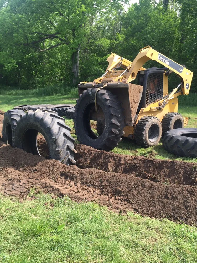 Custom yard cleanup service for beautiful yards in Columbia, TN by Adam's Tractor Works