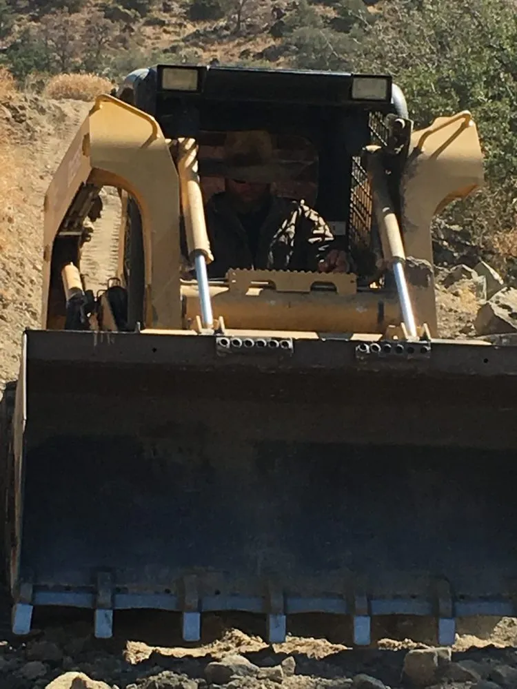 Affordable landscaping services for residential properties in Columbia, TN by Adam's Tractor Works