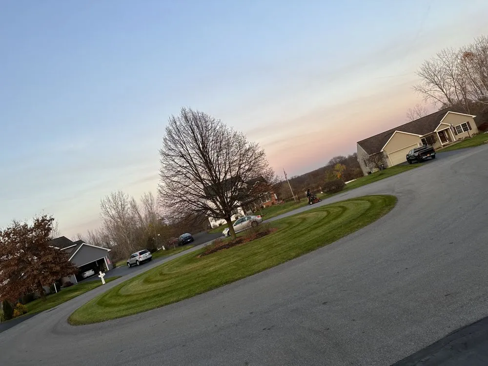 Professional lawn mowing service in Troy, NY by Adams