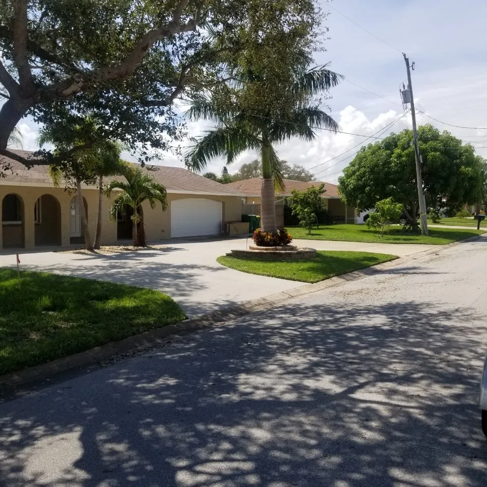 Expert yard cleanup service for homes in Satellite Beach, FL by Adara Lawn and Pool