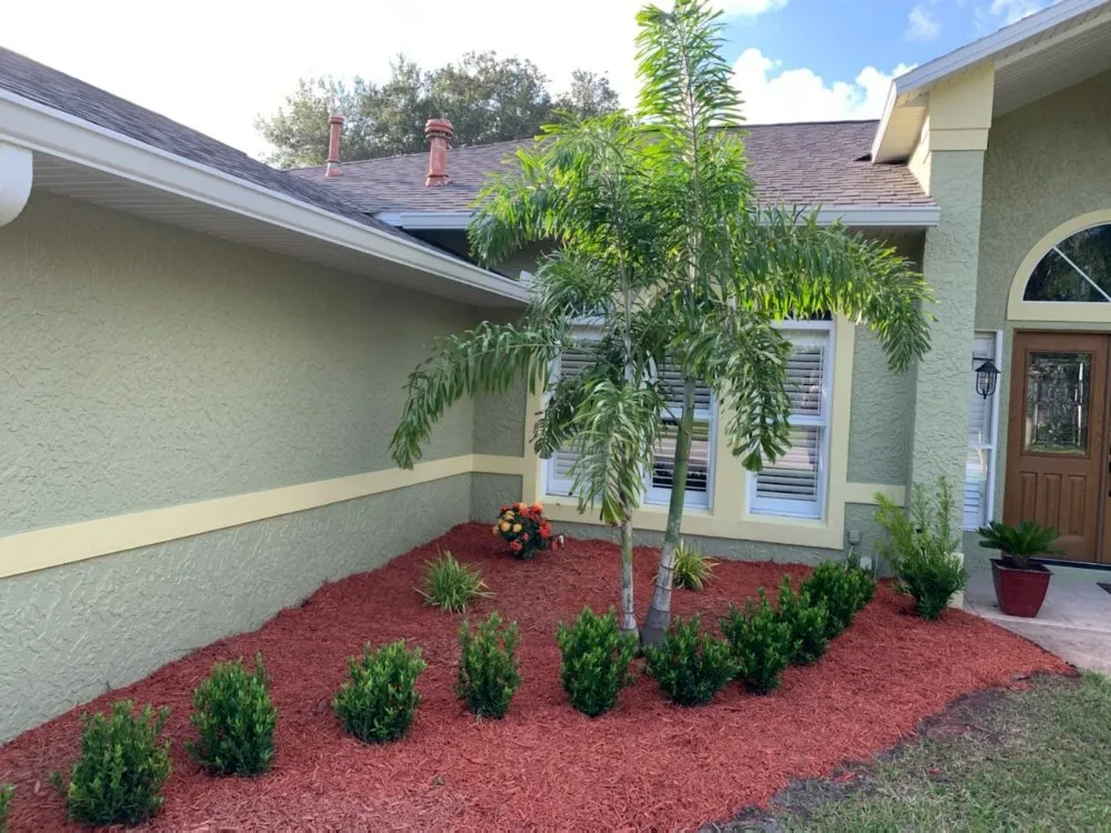 Professional residential landscaping with custom design in Satellite Beach, FL by Adara Lawn and Pool