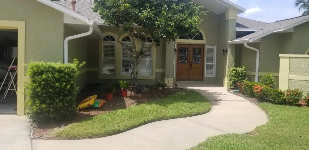 Custom outdoor landscaping in Satellite Beach, FL by Adara Lawn and Pool