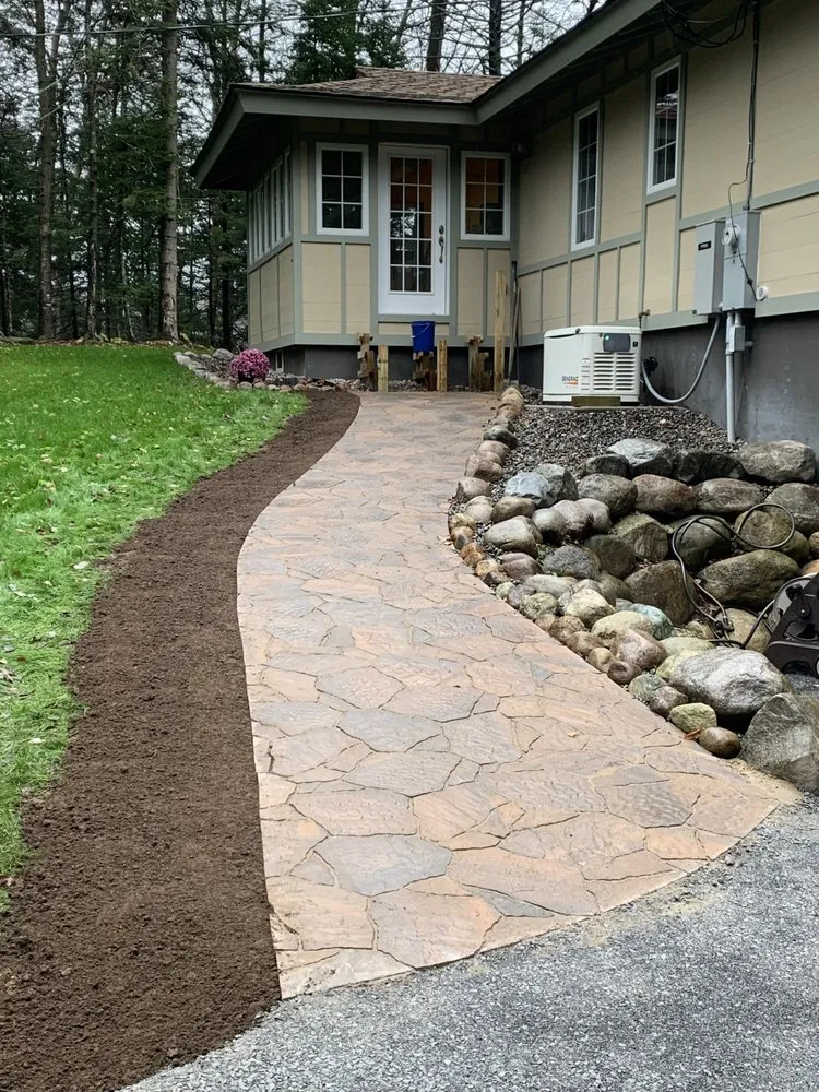 Professional landscaping services for year-round maintenance across Woodgate, NY - Adirondack Mountain Landscaping