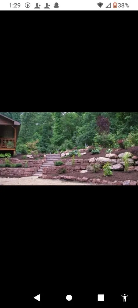 Affordable yard cleanup service with custom design in Queensbury, NY by Adirondack rustic hardscapes