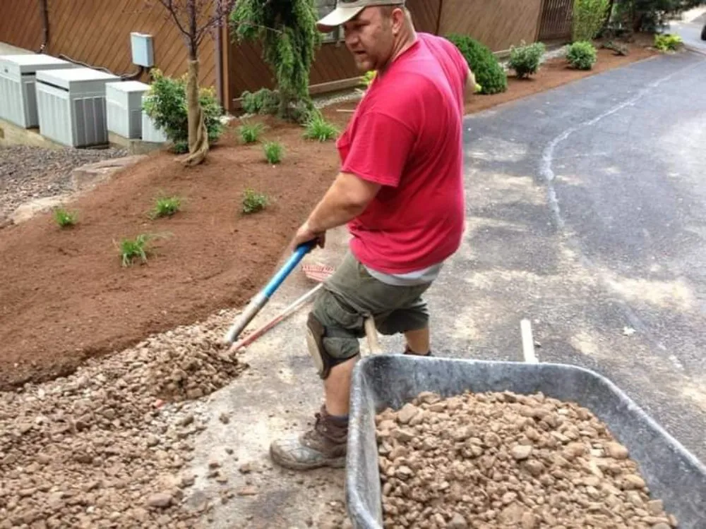 Trusted lawn mowing service with custom design across Queensbury, NY - Adirondack rustic hardscapes