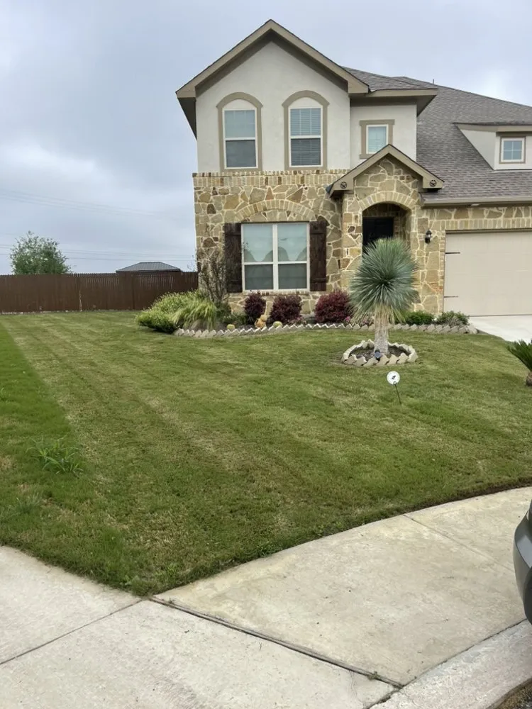 Custom yard maintenance with custom design in San Antonio, TX by Adkins Mowing
