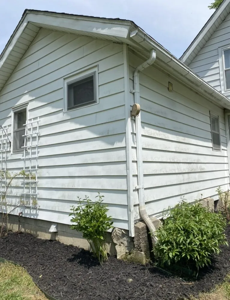 Professional lawn care service for residential properties in Clayton, MI by Adrian Lawn & Home