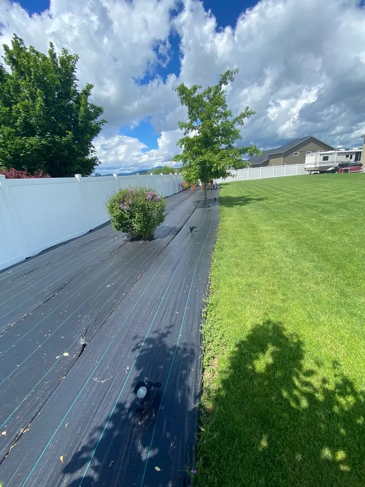 Affordable landscape design in Post Falls, ID - Advanced Bark Blowing