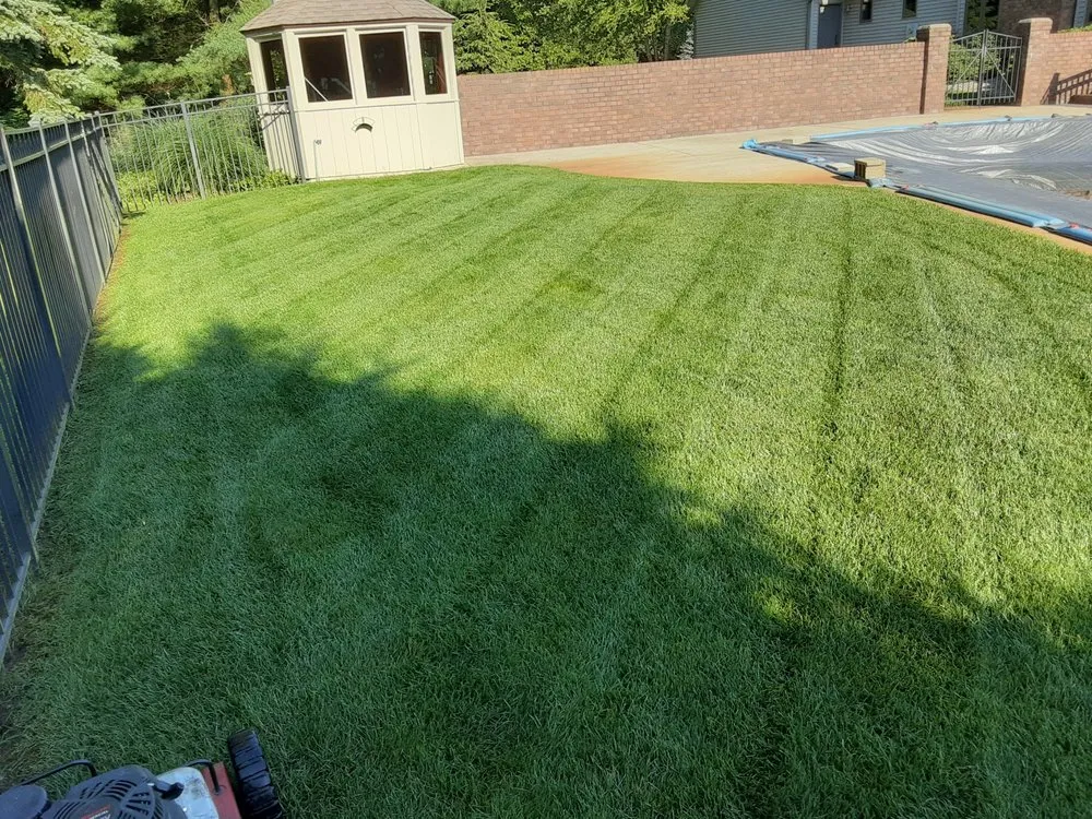 Professional lawn mowing service for homes in Holland, MI by Advanced Group Property Maintnance
