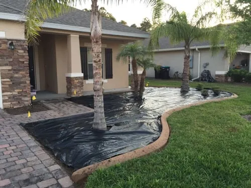 Custom landscape design for year-round maintenance in Melbourne, FL by Advanced Lawn & Landscaping