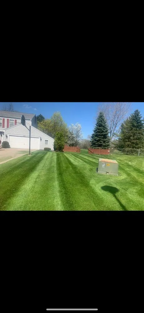 Custom yard cleanup service for year-round maintenance in Saginaw, MI by A&E Lawn Care and Snow Plowing
