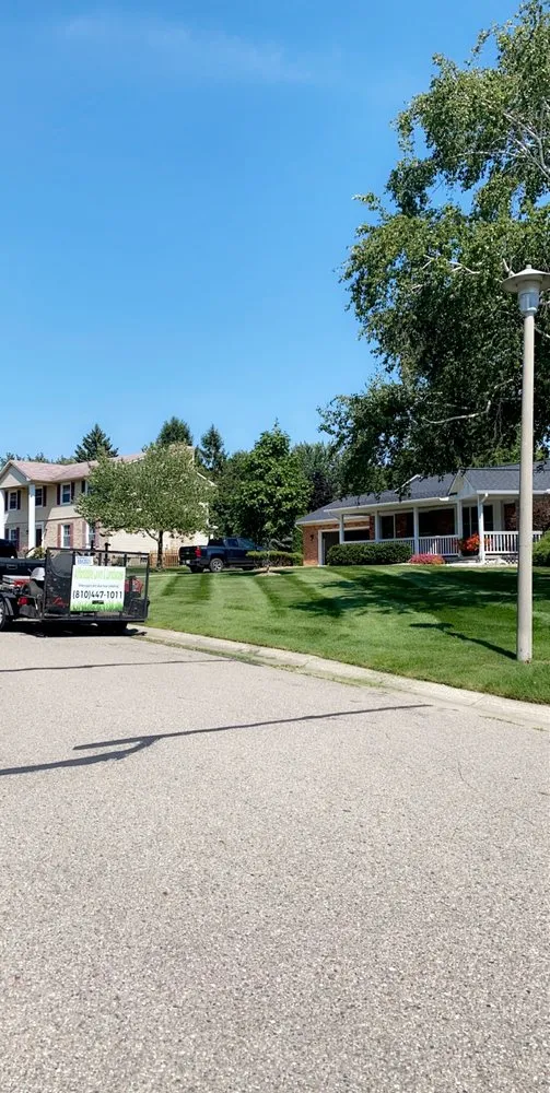 Custom residential landscaping with custom design in Burton, MI by Afforable Lawn & Landscape