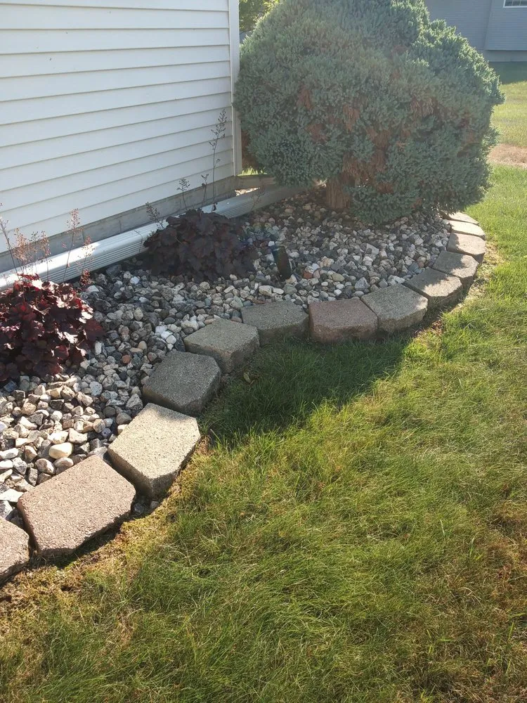 Custom garden landscaping in Flint, MI by Affordable Concrete & landscaping solutions