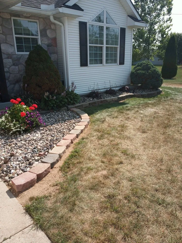 Expert landscape design for year-round maintenance in Flint, MI by Affordable Concrete & landscaping solutions