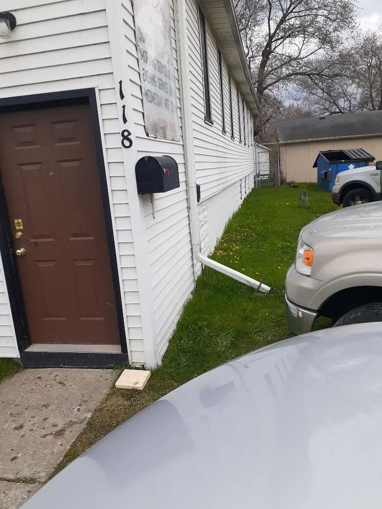 Expert yard cleanup service for beautiful yards across Flint, MI - Affordable Concrete & landscaping solutions