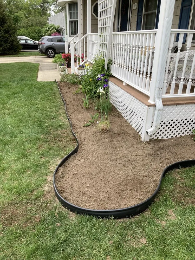 Custom landscape installation in Brick Township, NJ by Affordable Landscaping