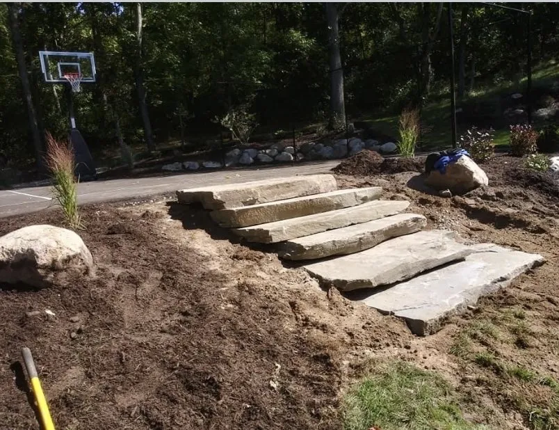 Local lawn mowing service with custom design in Rockford, MI by Affordable Landscaping