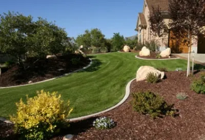 Custom lawn mowing service for homes in South Salt Lake, UT by Affordable Lawn Care and Landscape