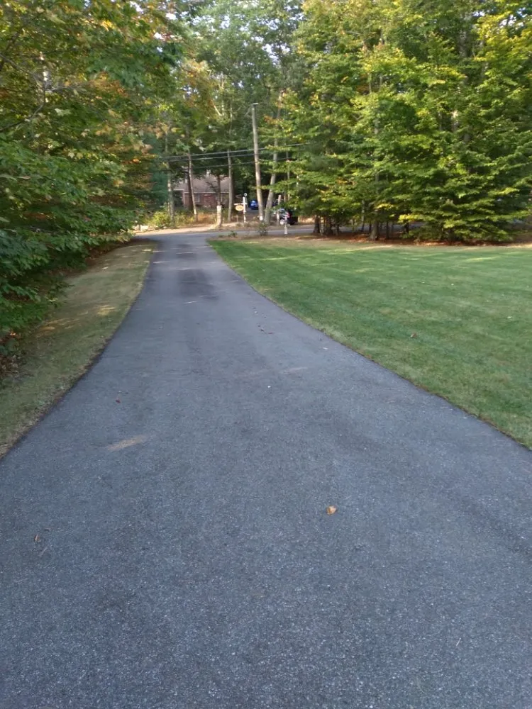 Custom lawn mowing service with custom design across Randolph, MA - Affordable Lawn Care