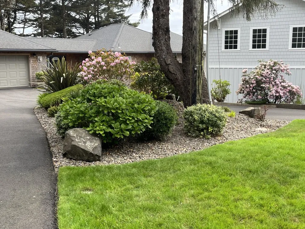 Top-rated landscape design with custom design in Newport, OR by After The Morning Surf Lawn Service