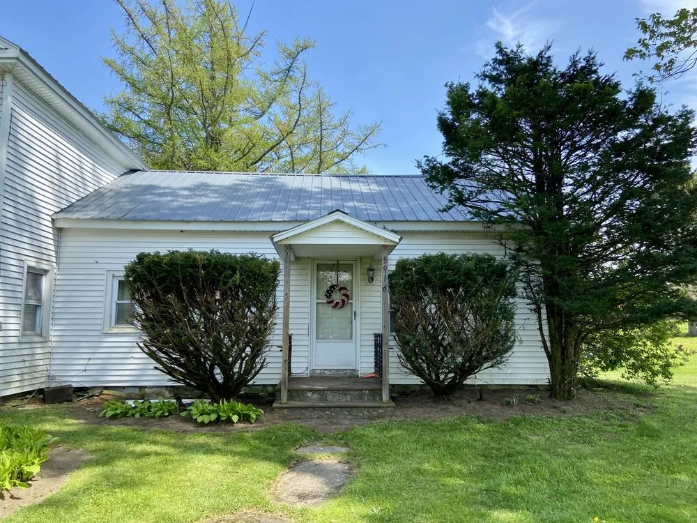 Professional yard maintenance for homes in Parish, NY by Against the Wind Lawn Care